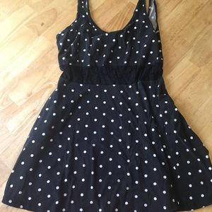 Black polka dot dress with lace cutout sleeveless